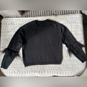 Elegant Sweater with Feather Detail